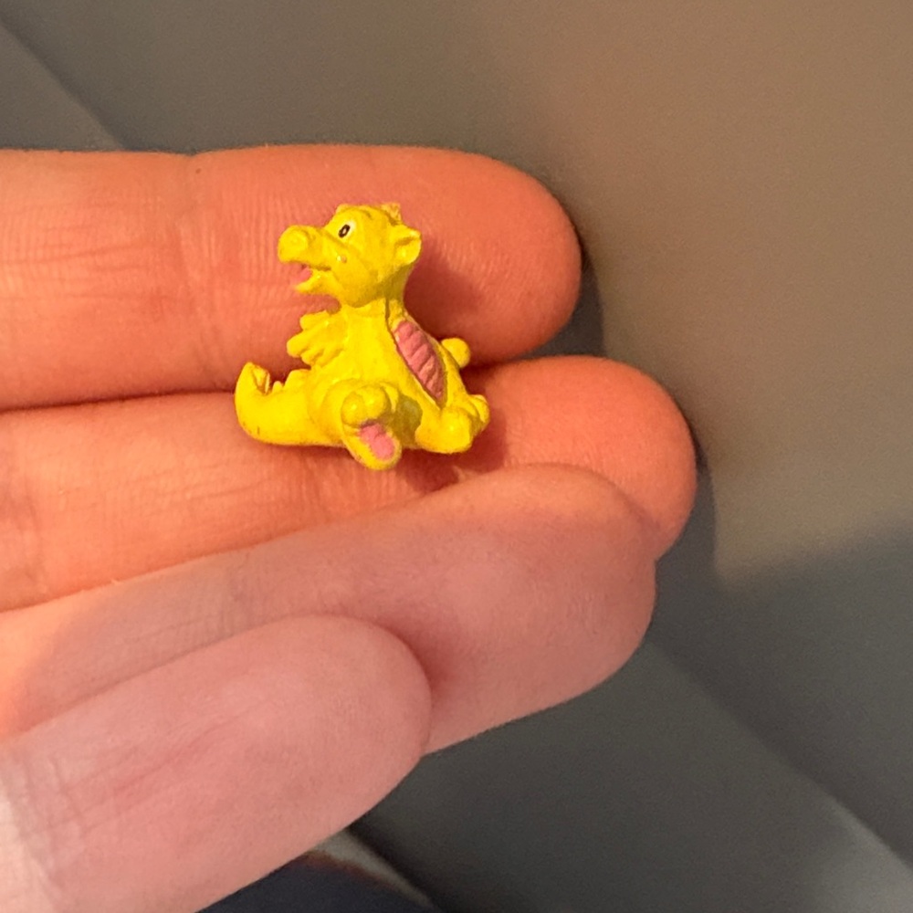 Tiny yellow dragon from Starcastle Kaleidoscope Locket By The Sea 1995
